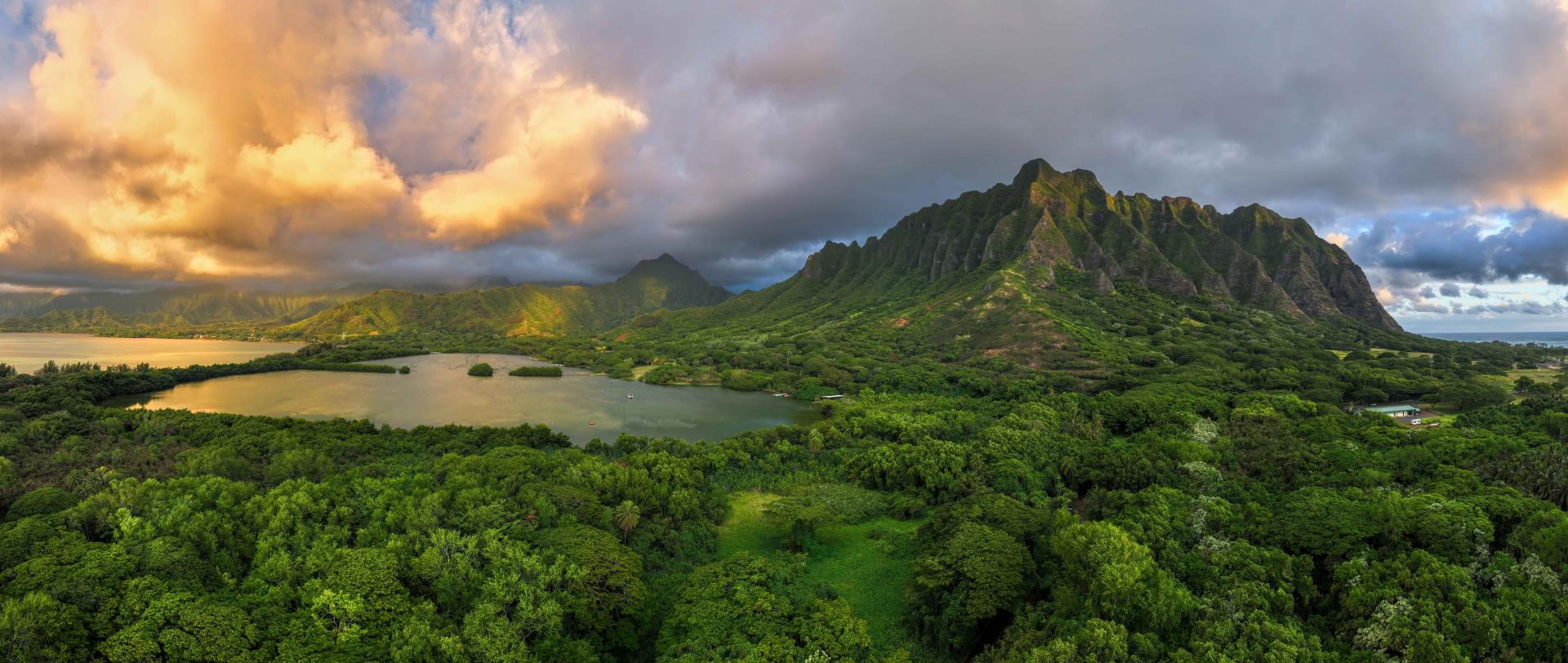 London Photography Awards Winner - Hawaiian Dawn: Sun-Kissed Clouds over Hawaiian Peaks